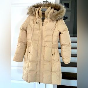 Puffer jacket with faux fur hood